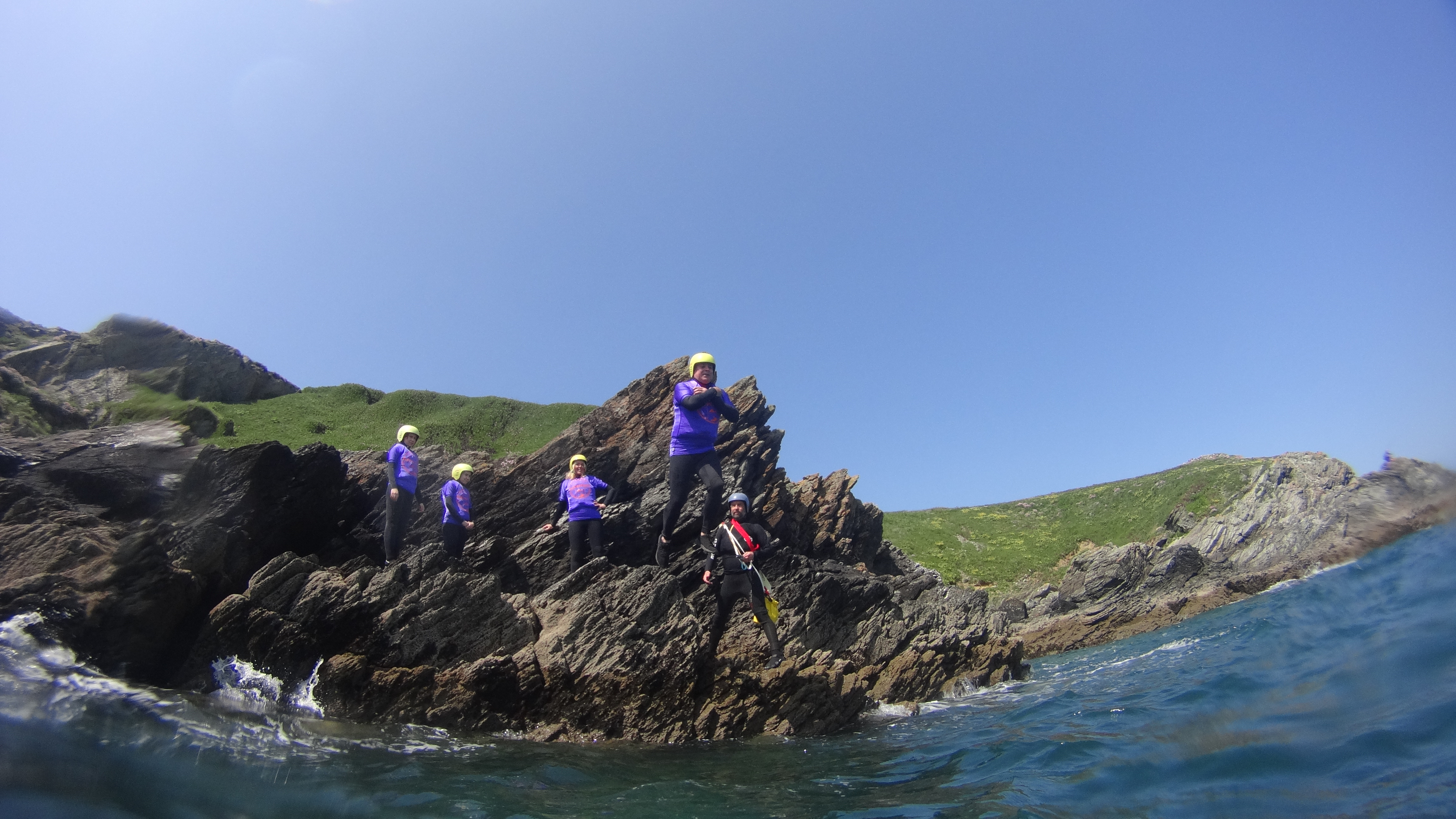 people coasteering