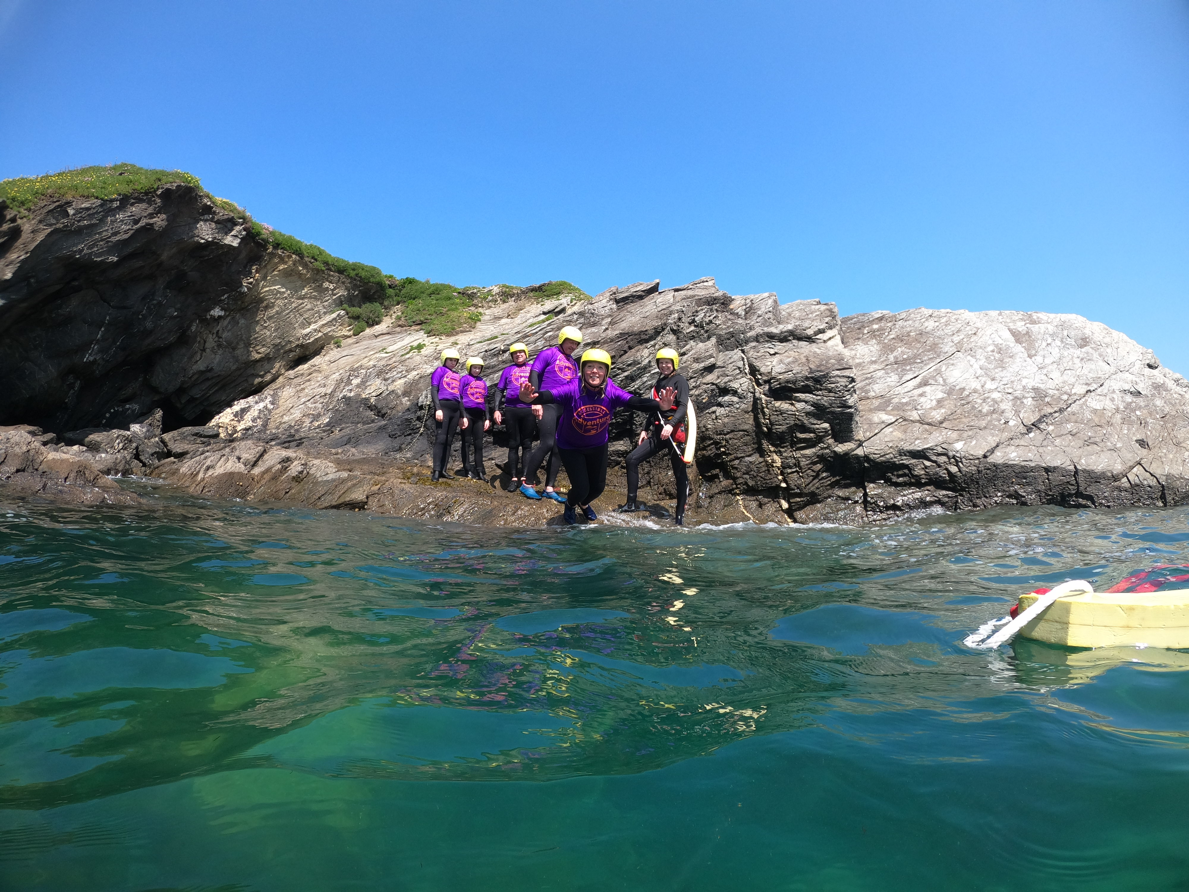 people coasteering