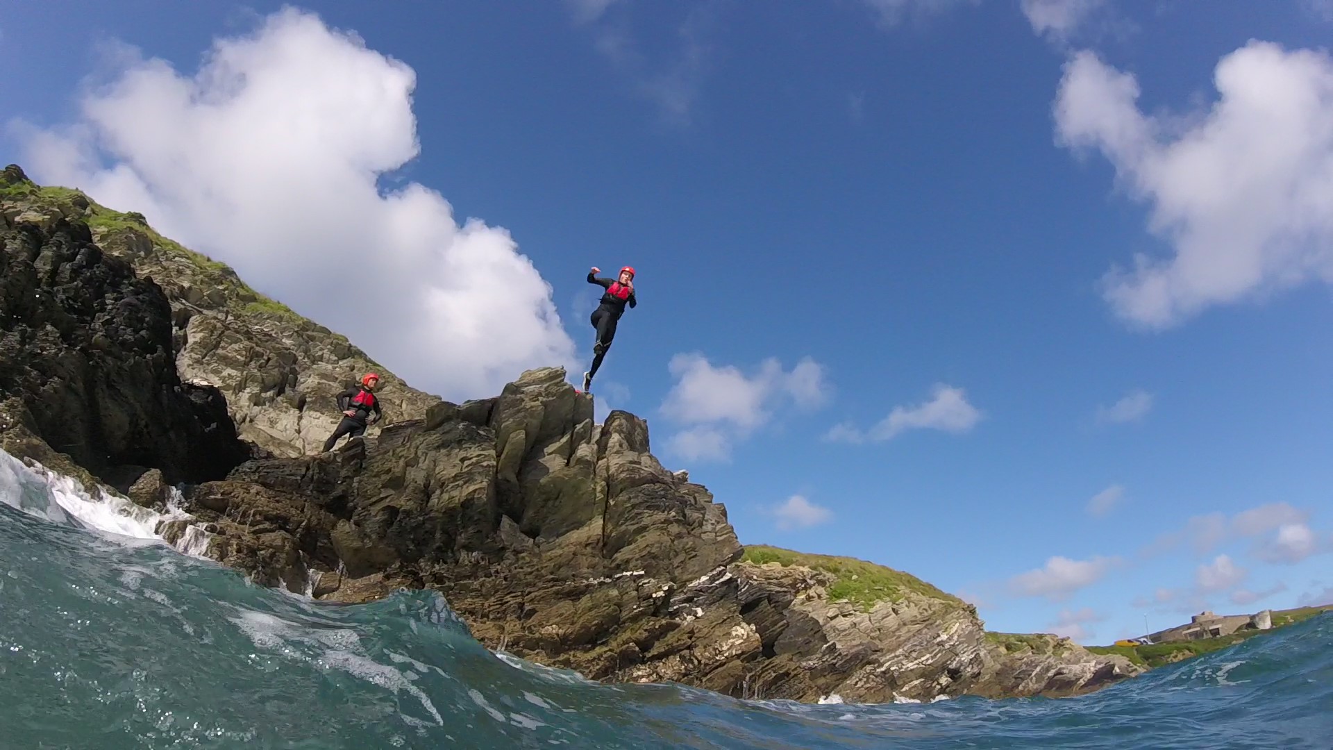 people coasteering